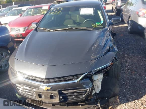 2018 Chevrolet Malibu LT z VIN 1G1ZD5ST8JF166998, wystawiony jako IAAI lot #43354038 z przebiegiem 100 794 mil mil oraz . Historia ofert i sprzedaży dostępna na DreamBid. Obrazek 11.