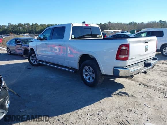 2020 Ram 1500 Laramie with VIN 1C6SRFRT3LN231617, listed as a IAAI auction lot 41280899 with 38,843 mi miles and . Bid and sale history available at DreamBid. Image 3.