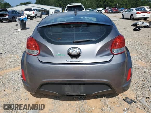 2012 Hyundai Veloster w/Black Int z VIN KMHTC6AD7CU028864, wystawiony jako Copart lot #66377895 z przebiegiem 130 440 mil mil oraz Szkoda całkowita • Salvage title. Historia ofert i sprzedaży dostępna na DreamBid. Obrazek 6.