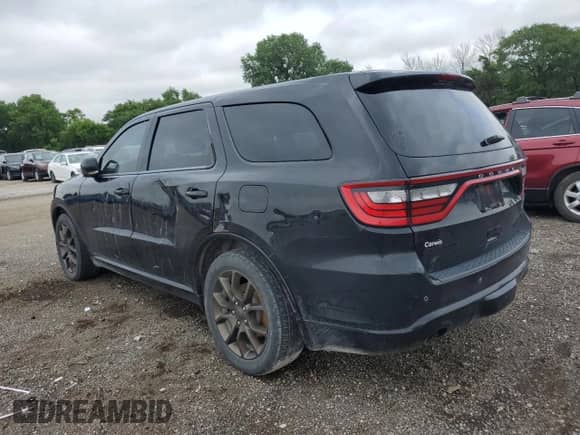 2018 Dodge Durango R/T with VIN 1C4SDJCT8JC327948, listed as a Copart auction lot 65422195 with 104,555 mi miles and Salvage title. Bid and sale history available at DreamBid. Image 2.