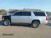2020 Chevrolet Suburban LT with VIN 1GNSKHKC6LR304885, listed as a IAAI auction lot 43213423 with 179,235 mi miles and . Bid and sale history available at DreamBid. Image 14.