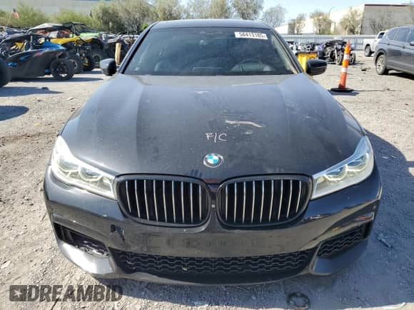 2017 BMW 7 Series 750i with VIN WBA7F0C59HGM21302, listed as a Copart auction lot 58413185 with 56,605 mi miles and Salvage title. Bid and sale history available at DreamBid. Image 5.