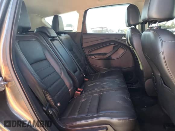 2017 Ford Escape Titanium с VIN 1FMCU0JD0HUB36440, выставлен на аукционе Copart как лот 70005225 с пробегом 130 016 миль миль и Списание • Salvage title. История ставок и продаж доступна на DreamBid. Изображение 11.