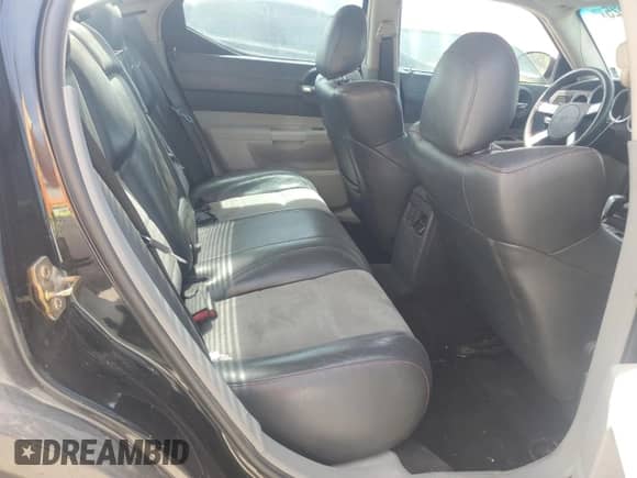 2006 Dodge Charger SRT-8 z VIN 2B3KA73W26H265877, wystawiony jako Copart lot #62549525 z przebiegiem 183 017 mil mil oraz Szkoda całkowita • Salvage title. Historia ofert i sprzedaży dostępna na DreamBid. Obrazek 10.