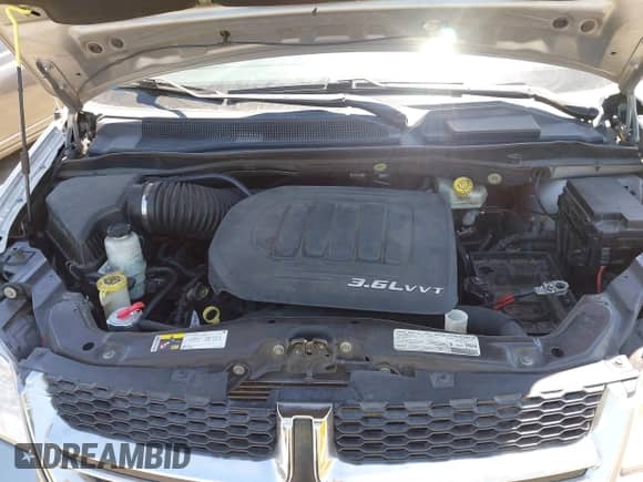 2013 Dodge Grand Caravan SXT with VIN 2C4RDGCG5DR669051, listed as a IAAI auction lot 42690993 with Not provided miles and . Bid and sale history available at DreamBid. Image 10.