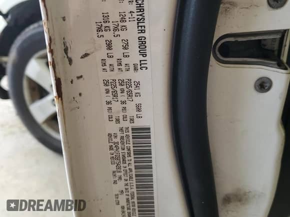 2011 Dodge Journey Mainstreet z VIN 3D4PH1FG5BT542818, wystawiony jako Copart lot #69951995 z przebiegiem 160 212 mil mil oraz Szkoda całkowita • Salvage title. Historia ofert i sprzedaży dostępna na DreamBid. Obrazek 13.