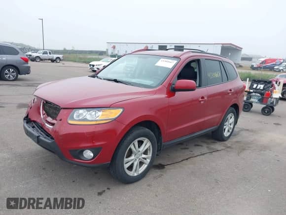 2011 Hyundai Santa Fe SE with VIN 5XYZHDAG1BG076925, listed as a IAAI auction lot 43204667 with 320,107 mi miles and . Bid and sale history available at DreamBid. Image 17.
