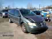 2004 Dodge Caravan SE with VIN 1D4GP24R04B520727, listed as a Copart auction lot 52002475 with 164,954 mi miles and Salvage title. Bid and sale history available at DreamBid. Image 11.