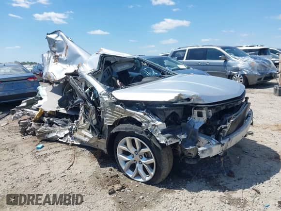 2018 Chevrolet Impala Premier with VIN 2G1125S33J9136125, listed as a IAAI auction lot 42012548 with 151,731 mi miles and . Bid and sale history available at DreamBid. Image 1.