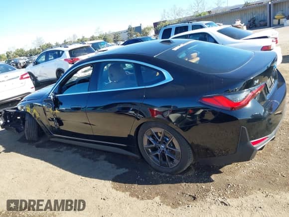 2024 BMW i4 xDrive40 с VIN WBY83FB06RFS62947, выставлен на аукционе IAAI как лот 41280950 с пробегом 3 216 миль миль и . История ставок и продаж доступна на DreamBid. Изображение 15.