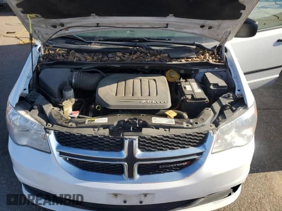 2016 Dodge Grand Caravan American Value z VIN 2C4RDGBG1GR386457, wystawiony jako Copart lot #85206695 z przebiegiem 293 889 mil mil oraz Czysty tytuł • Clean title. Historia ofert i sprzedaży dostępna na DreamBid. Obrazek 12.