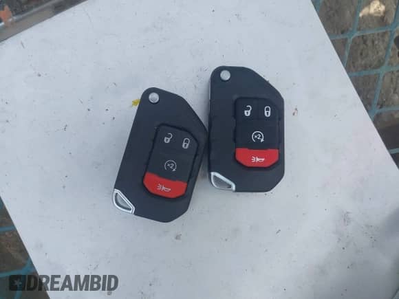 2021 Jeep Wrangler Unlimited 80th Anniversary with VIN 1C4HJXDG6MW662281, listed as a IAAI auction lot 43194178 with 52,603 mi miles and . Bid and sale history available at DreamBid. Image 11.