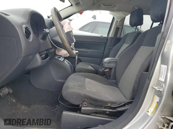 2011 Jeep Compass z VIN 1J4NT1FA9BD289968, wystawiony jako Copart lot #68313965 z przebiegiem 152 935 mil mil oraz Szkoda całkowita • Salvage title. Historia ofert i sprzedaży dostępna na DreamBid. Obrazek 7.