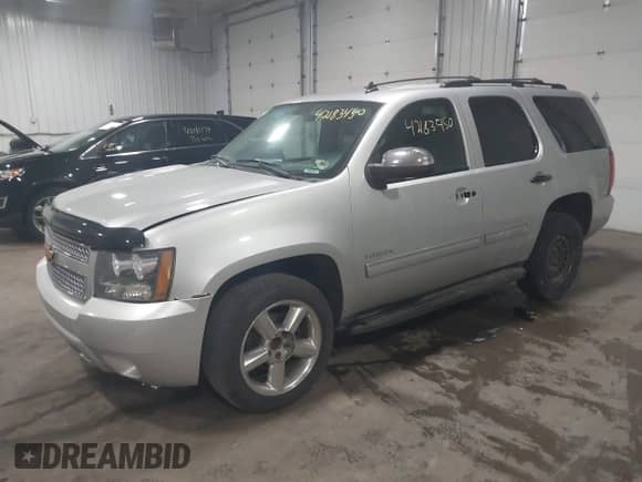 2012 Chevrolet Tahoe LT with VIN 1GNSCBE01CR326465, listed as a IAAI auction lot 42183450 with 220,129 mi miles and . Bid and sale history available at DreamBid. Image 17.