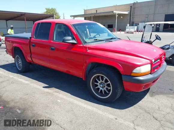 2002 Dodge Dakota Sport with VIN 1B7HL38N22S531073, listed as a IAAI auction lot 42687273 with 189,153 mi miles and . Bid and sale history available at DreamBid. Image 1.