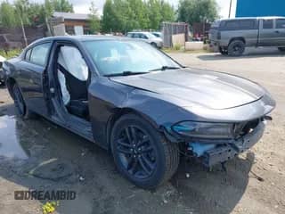 2019 Dodge Charger SXT with VIN 2C3CDXJG9KH637705, listed as a IAAI auction lot 42585356 with 97,632 mi miles and . Bid and sale history available at DreamBid. Image 1.