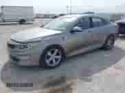 2016 Kia Optima EX with VIN 5XXGU4L34GG059142, listed as a IAAI auction lot 43519874 with 141,445 mi miles and . Bid and sale history available at DreamBid. Image 2.