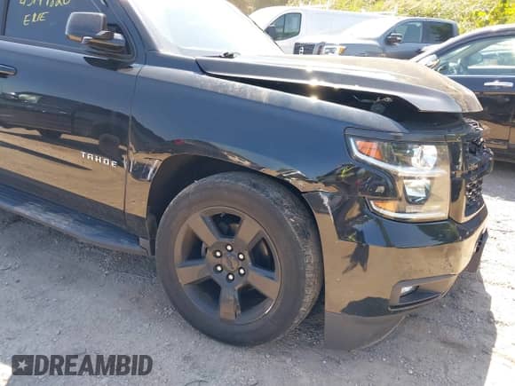 2018 Chevrolet Tahoe LT z VIN 1GNSKBKC9JR202765, wystawiony jako IAAI lot #43149820 z przebiegiem 79 113 mil mil oraz . Historia ofert i sprzedaży dostępna na DreamBid. Obrazek 19.