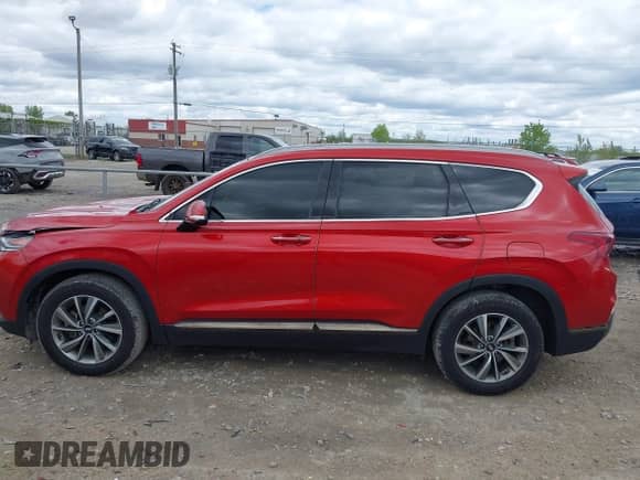 2019 Hyundai Santa Fe Ultimate z VIN 5NMS5CAD9KH026094, wystawiony jako IAAI lot #42316150 z przebiegiem 106 264 mil mil oraz . Historia ofert i sprzedaży dostępna na DreamBid. Obrazek 14.