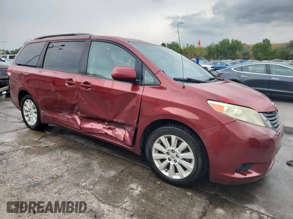 2011 Toyota Sienna LE AAS with VIN 5TDKK3DC8BS043204, listed as a Copart auction lot 70552335 with 172,924 mi miles and Salvage title. Bid and sale history available at DreamBid. Image 4.