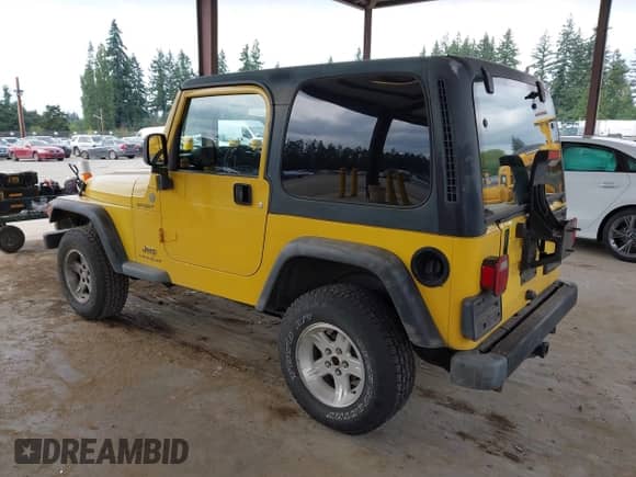 2004 Jeep Wrangler Sport z VIN 1J4FA49S04P788403, wystawiony jako IAAI lot #43184950 z przebiegiem 290 533 mil mil oraz . Historia ofert i sprzedaży dostępna na DreamBid. Obrazek 3.