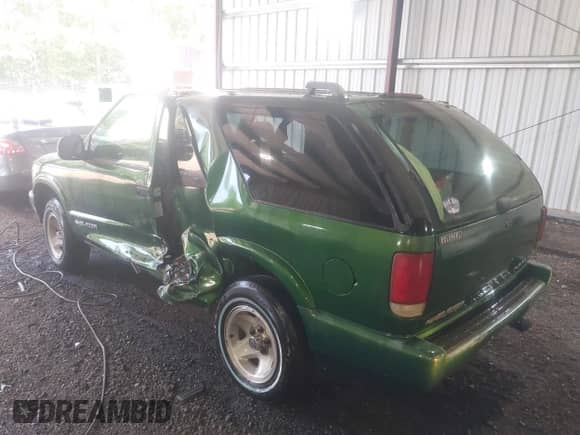 1997 Chevrolet Blazer LS z VIN 1GNCS18W5VK109319, wystawiony jako IAAI lot #42603720 z przebiegiem 91 974 mil mil oraz . Historia ofert i sprzedaży dostępna na DreamBid. Obrazek 6.
