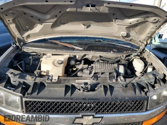 2003 Chevrolet Express Passenger with VIN 1GAHG39U831149690, listed as a Copart auction lot 87654505 with 166,729 mi miles and Salvage title. Bid and sale history available at DreamBid. Image 12.
