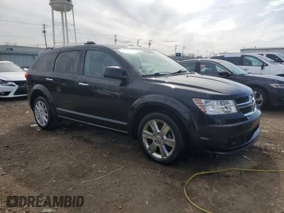 2011 Dodge Journey LUX с VIN 3D4PG9FG7BT509935, выставлен на аукционе Copart как лот 52867435 с пробегом 118 793 миль миль и Списание • Salvage title. История ставок и продаж доступна на DreamBid. Изображение 4.