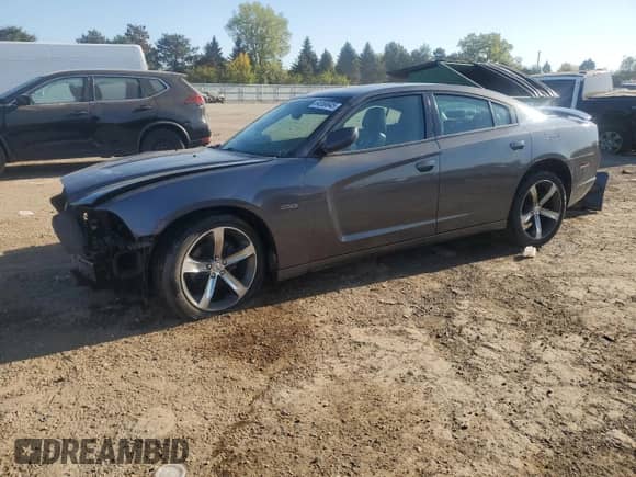 2014 Dodge Charger SXT with VIN 2C3CDXHGXEH232141, listed as a Copart auction lot 84556645 with 167,659 mi miles and Salvage title. Bid and sale history available at DreamBid. Image 1.