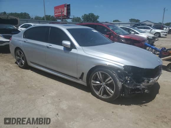 2016 BMW 7 Series 750i xDrive с VIN WBA7F2C59GG417311, выставлен на аукционе Copart как лот 61777655 с пробегом 103 374 миль миль и Списание • Salvage title. История ставок и продаж доступна на DreamBid. Изображение 4.