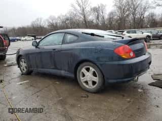 2003 Hyundai Tiburon GT с VIN KMHHN65F13U068658, выставлен на аукционе Copart как лот 81799404 с пробегом 163 148 миль миль и Списание • Salvage title. История ставок и продаж доступна на DreamBid. Изображение 2.