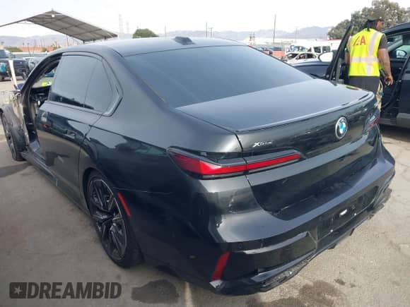 2023 BMW 7 Series 760i xDrive with VIN WBA33EJ02PCL90220, listed as a IAAI auction lot 41042194 with Not provided miles and . Bid and sale history available at DreamBid. Image 3.