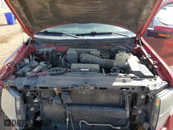 2013 Ford F-150 XLT z VIN 1FTFW1E6XDFC98555, wystawiony jako Copart lot #81559175 z przebiegiem 242 520 mil mil oraz Szkoda całkowita • Salvage title. Historia ofert i sprzedaży dostępna na DreamBid. Obrazek 11.