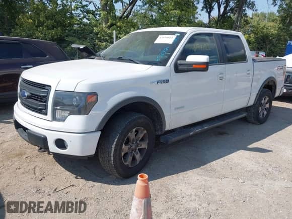 2013 Ford F-150 Lariat z VIN 1FTFW1ET0DKD46349, wystawiony jako IAAI lot #43194022 z przebiegiem 184 533 mil mil oraz . Historia ofert i sprzedaży dostępna na DreamBid. Obrazek 2.