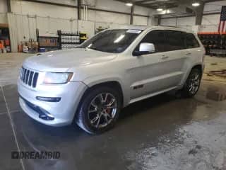 2012 Jeep Grand Cherokee SRT-8 z VIN 1C4RJFDJ2CC105829, wystawiony jako Copart lot #51840385 z przebiegiem 142 146 mil mil oraz Czysty tytuł • Clean title. Historia ofert i sprzedaży dostępna na DreamBid. Obrazek 1.
