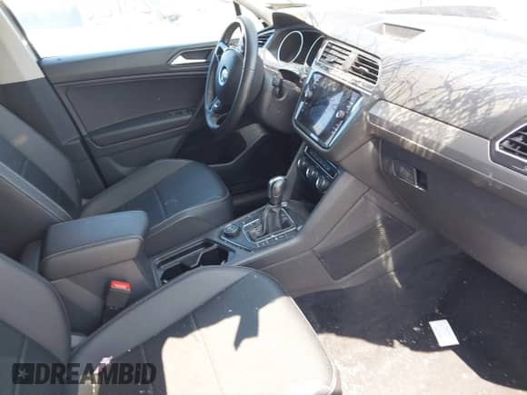 2021 Volkswagen Tiguan SE с VIN 3VV2B7AX4MM091592, выставлен на аукционе IAAI как лот 42520122 с пробегом 87 485 миль миль и . История ставок и продаж доступна на DreamBid. Изображение 5.