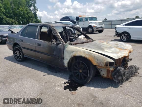 1993 Honda Accord с VIN 1HGCB757XPA014595, выставлен на аукционе Copart как лот 62500145 с пробегом 290 252 миль миль и Списание • Salvage title. История ставок и продаж доступна на DreamBid. Изображение 4.