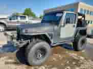 1997 Jeep Wrangler Sport with VIN 1J4FY19SXVP483096, listed as a Copart auction lot 71246695 with 261,698 mi miles and Salvage title. Bid and sale history available at DreamBid. Image 1.