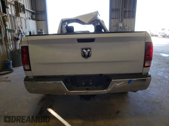 2020 Ram 1500 Tradesman with VIN 3C6JR6DT9LG189823, listed as a Copart auction lot 77557314 with 64,279 mi miles and Salvage title. Bid and sale history available at DreamBid. Image 6.