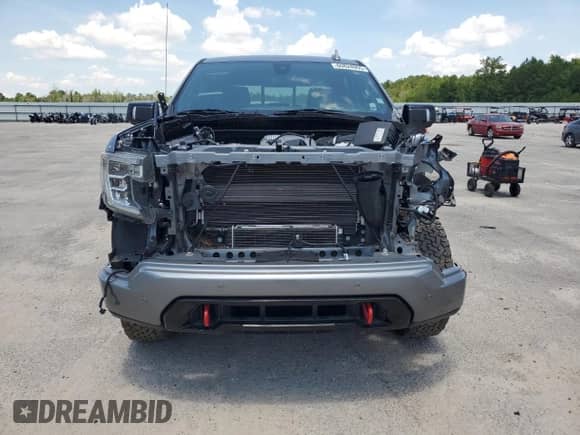 2021 GMC Sierra 1500 AT4 with VIN 1GTU9EET7MZ201306, listed as a Copart auction lot 60824955 with Not provided miles and Salvage title. Bid and sale history available at DreamBid. Image 5.