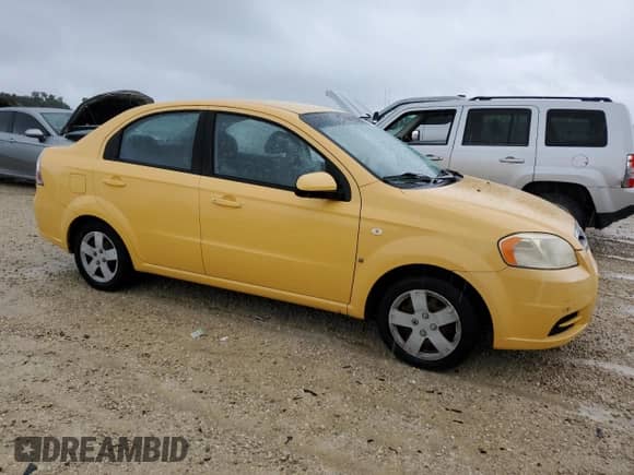 2008 Chevrolet Aveo LS с VIN KL1TD56628B141878, выставлен на аукционе Copart как лот 74777694 с пробегом Не указан миль и Списание • Salvage title. История ставок и продаж доступна на DreamBid. Изображение 4.