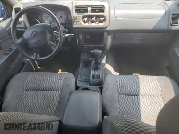 2001 Nissan Frontier SE with VIN 1N6ED27T41C347012, listed as a Copart auction lot 59388375 with 284,480 mi miles and Salvage title. Bid and sale history available at DreamBid. Image 8.