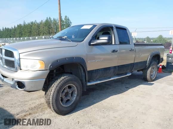 2004 Dodge 2500 SLT z VIN 1D7KU28D54J141331, wystawiony jako IAAI lot #42536806 z przebiegiem 166 165 mil mil oraz . Historia ofert i sprzedaży dostępna na DreamBid. Obrazek 2.