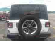 2021 Jeep Wrangler Unlimited Sahara Altitude z VIN 1C4HJXEN8MW536100, wystawiony jako IAAI lot #37184105 z przebiegiem 62 965 mil mil oraz . Historia ofert i sprzedaży dostępna na DreamBid. Obrazek 16.