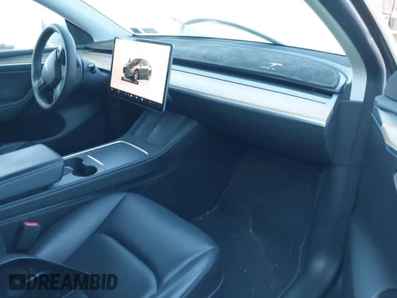 2023 Tesla Model Y Long Range with VIN 7SAYGDEE6PA098084, listed as a IAAI auction lot 43095726 with 30,506 mi miles and . Bid and sale history available at DreamBid. Image 5.