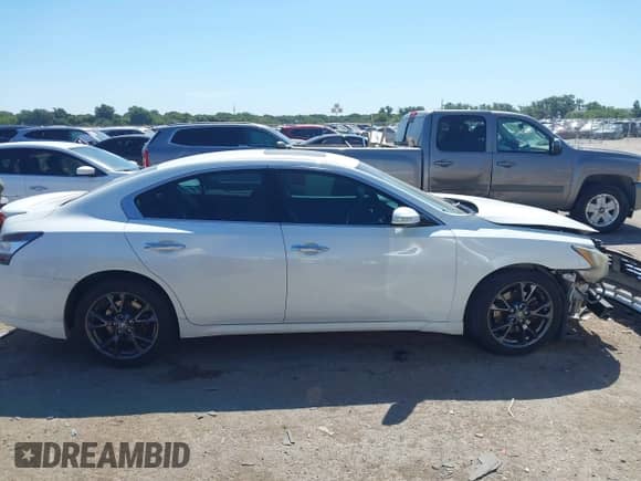 2014 Nissan Maxima SV z VIN 1N4AA5AP1EC466817, wystawiony jako IAAI lot #42810795 z przebiegiem 113 444 mil mil oraz . Historia ofert i sprzedaży dostępna na DreamBid. Obrazek 13.