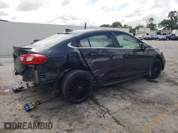 2016 Chevrolet Cruze LT с VIN 1G1BE5SM4G7255137, выставлен на аукционе Copart как лот 59882305 с пробегом 130 088 миль миль и Списание • Salvage title. История ставок и продаж доступна на DreamBid. Изображение 3.