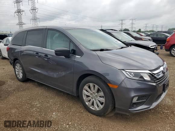 2019 Honda Odyssey LX with VIN 5FNRL6H2XKB131240, listed as a Copart auction lot 67848005 with 75,844 mi miles and Salvage title. Bid and sale history available at DreamBid. Image 4.