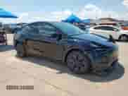 2024 Tesla Model Y Long Range with VIN 7SAYGAEE0RF159224, listed as a Copart auction lot 68552555 with 20,077 mi miles and Clean title. Bid and sale history available at DreamBid. Image 4.