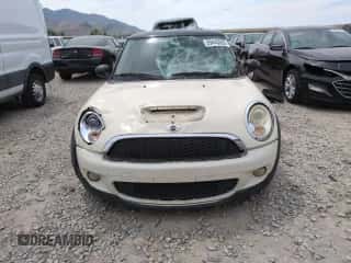 2009 MINI Hardtop S with VIN WMWMF73569TW87347, listed as a Copart auction lot 59445035 with 118,336 mi miles and Salvage title. Bid and sale history available at DreamBid. Image 5.